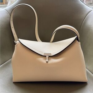 NWOT Toteme T-Lock leather bag/clutch in color milk